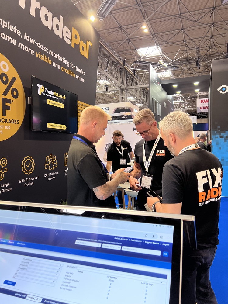 Martyn from TradePal talks with Fix Radio presenters at InstallerSHOW 2025, inside the NEC Birmingham.
