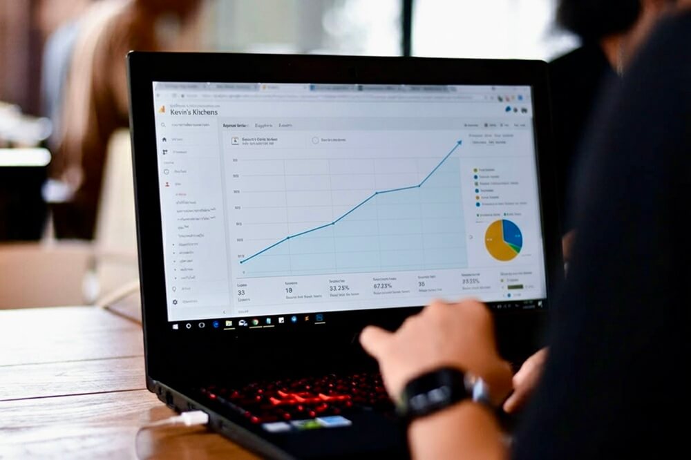 A laptop screen displaying marketing analytics and lead data, showing how TradePal helps kitchen fitters track performance, measure results, and grow their business.