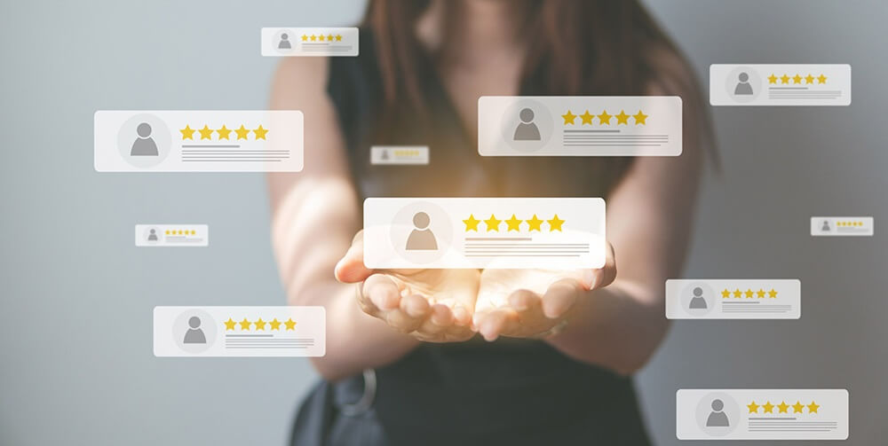 A person holding glowing five-star customer reviews, symbolising how TradePal helps kitchen fitters collect and display feedback to build trust and grow their reputation.